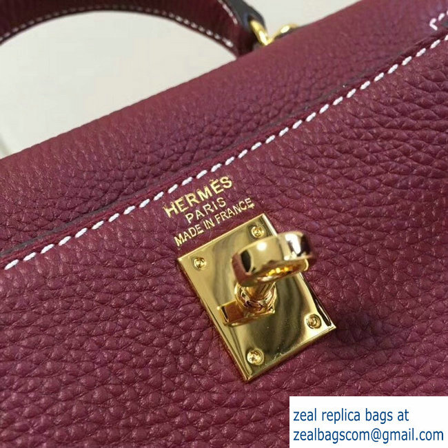 Hermes mini kelly 20 bag Burgundy in clemence leather with golden hardware