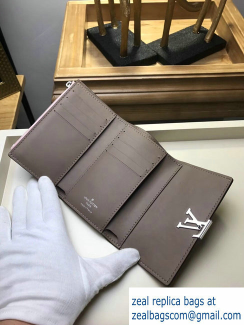 Louis Vuitton Capucines Compact Wallet M62156 Magnolia