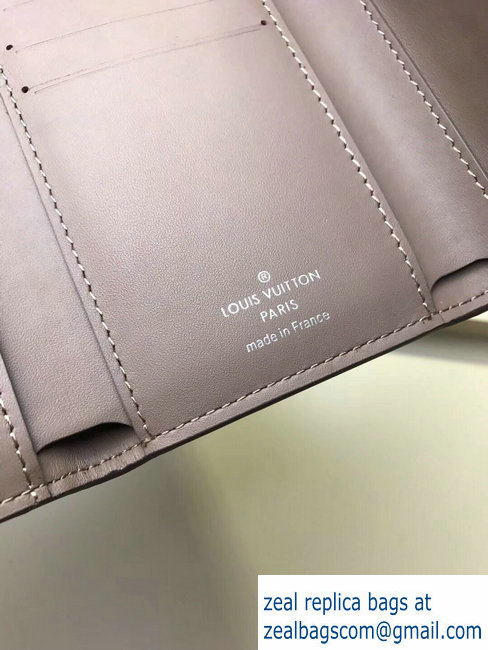 Louis Vuitton Capucines Compact Wallet M62156 Magnolia
