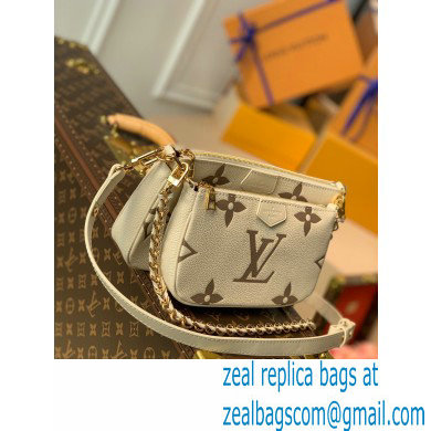 louis vuitton white Monogram Empreinte leather Multi Pochette Accessoires m45777