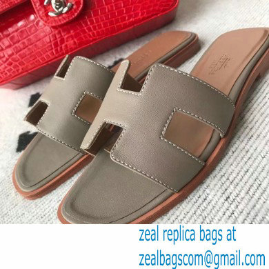 Hermes Oran Flat Sandals in Swift Box Calfskin 75