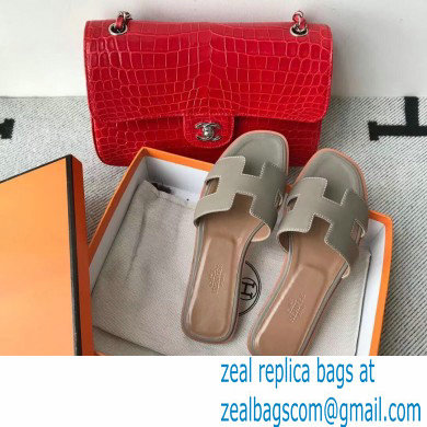 Hermes Oran Flat Sandals in Swift Box Calfskin 75