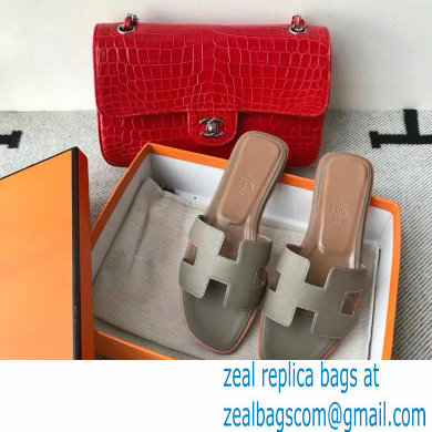 Hermes Oran Flat Sandals in Swift Box Calfskin 75