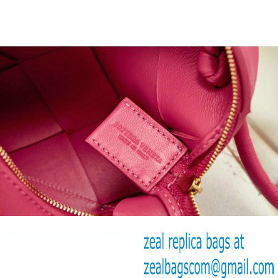 Bottega Veneta Mini intreccio leather cross-body cassette camera bag Fuchsia