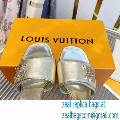 Louis Vuitton Heel 8.5cm Shake Mules in Metallic lambskin Gold 2023