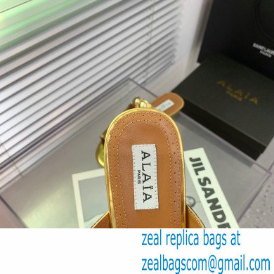Alaia Bombe metallic leather sandals gold 2023