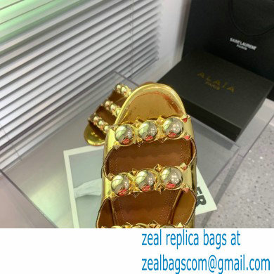 Alaia Bombe metallic leather sandals gold 2023