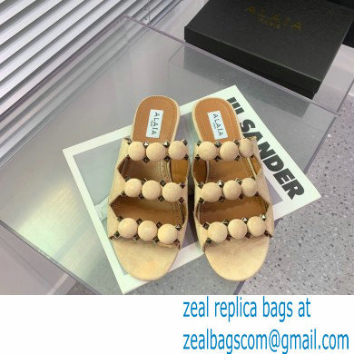 Alaia Bombe suede slides nude 2023