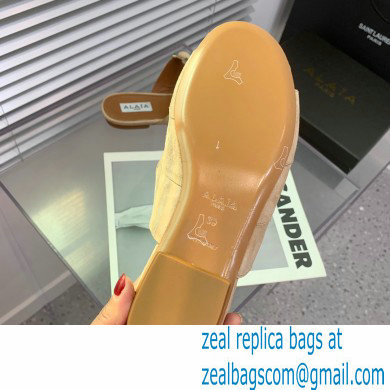 Alaia Bombe suede slides nude 2023