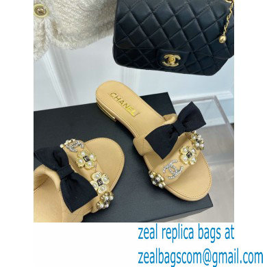 Chanel Pearl and Bow Lambskin Mules G40132 Beige 2023