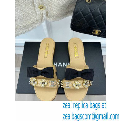 Chanel Pearl and Bow Lambskin Mules G40132 Beige 2023