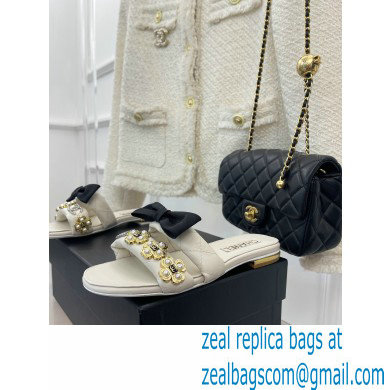 Chanel Pearl and Bow Lambskin Mules G40132 White 2023