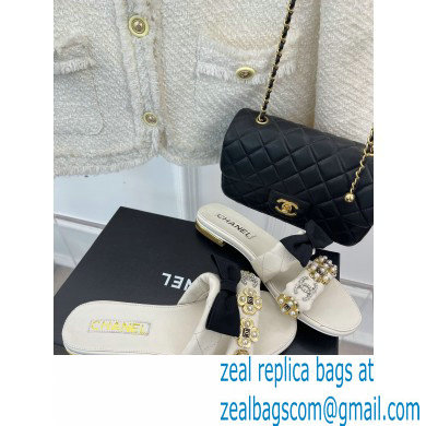 Chanel Pearl and Bow Lambskin Mules G40132 White 2023