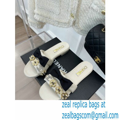 Chanel Pearl and Bow Lambskin Mules G40132 White 2023