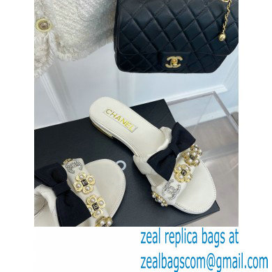 Chanel Pearl and Bow Lambskin Mules G40132 White 2023