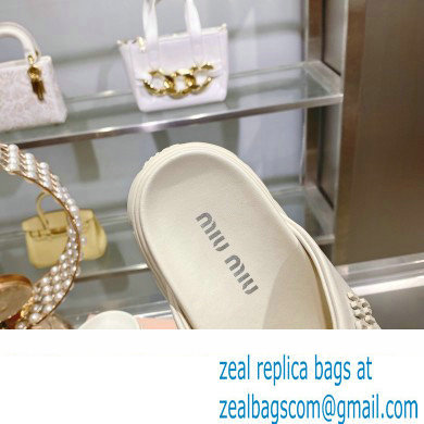 Miu Miu Leather Platform slides Creamy with metal lettering logo 2023