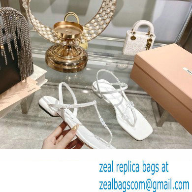 Miu Miu Patent thong sandals White with metal lettering logo 2023