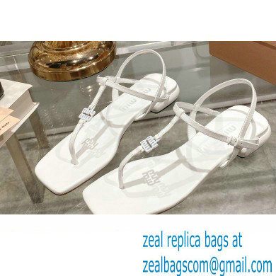 Miu Miu Patent thong sandals White with metal lettering logo 2023