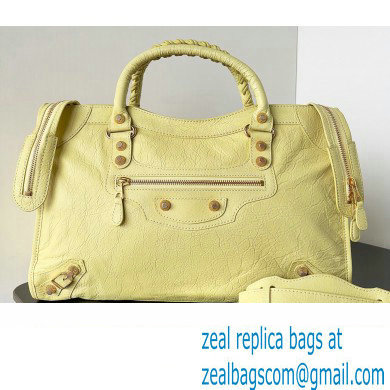 Balenciaga Classic City Large Handbag with Spiral Hardware in Arena Lambskin Light Yellow/Gold - Click Image to Close