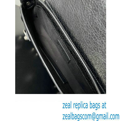 Balenciaga Le Cagole XS Sling Bag in Arena calfskin Black Spring 2024