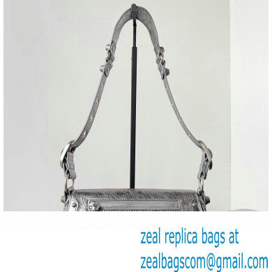 Balenciaga Le Cagole XS Sling Bag in Arena calfskin Silver Spring 2024