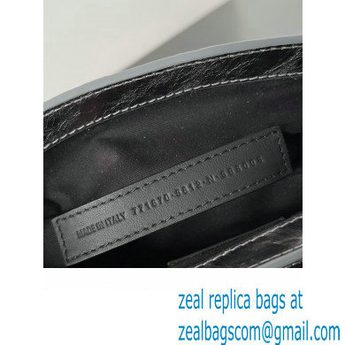 Balenciaga Le Cagole XS Sling Bag in Arena calfskin Silver Spring 2024