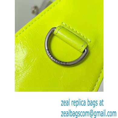 Balenciaga Superbusy XS Sling Bag in Arena calfskin neon yellow 2023