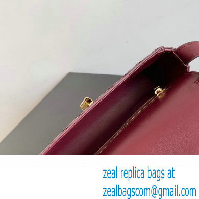 Bottega Veneta Mini Andiamo Cross-Body Intrecciato leather bag BAROLO with metallic knot closure 2024 - Click Image to Close