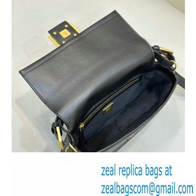 Fendi by Stefano Pilati Medium Baguette Bag handle with metal FENDI lettering in Black nappa leather 2024