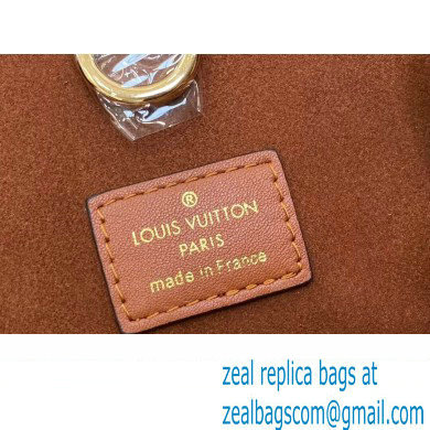 Louis Vuitton Taurillon leather Lock It MM Bag M22925 Gold 2023