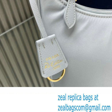 Prada Re-Edition 2000 Re-Nylon and Saffiano Mini Hobo Bag 1NE515 Pale Blue/Gold 2024 - Click Image to Close