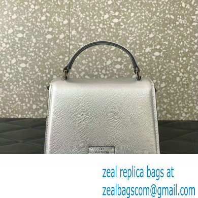 Valentino Mini VSLING Handbag in metallic Silver grainy calfskin with VLogo Signature crystals 2024 - Click Image to Close