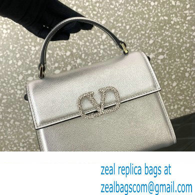 Valentino Mini VSLING Handbag in metallic Silver grainy calfskin with VLogo Signature crystals 2024