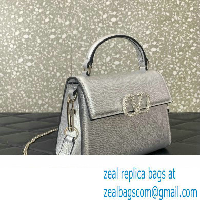 Valentino Mini VSLING Handbag in metallic Silver grainy calfskin with VLogo Signature crystals 2024 - Click Image to Close