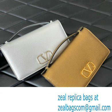 Valentino Vlogo Signature Wallet With Chain in Grainy Calfskin Gold 2024