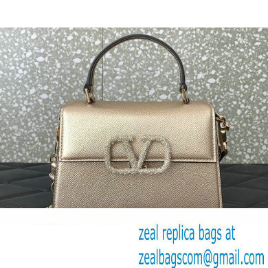 Valentino small VSLING Handbag in metallic Gold grainy calfskin with VLogo Signature crystals 2024 - Click Image to Close