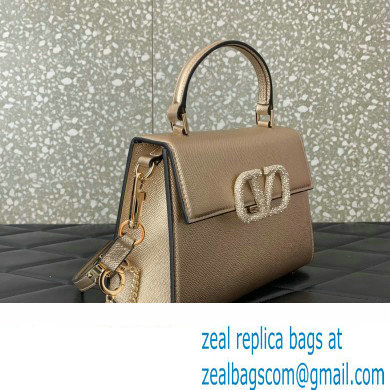 Valentino small VSLING Handbag in metallic Gold grainy calfskin with VLogo Signature crystals 2024 - Click Image to Close