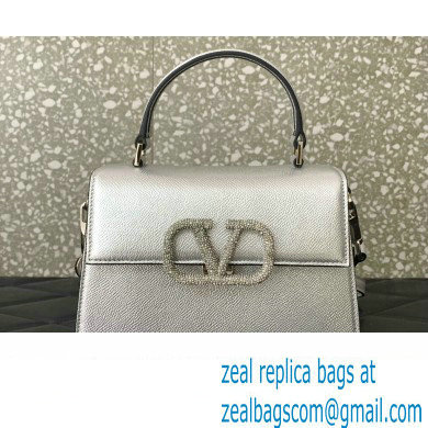 Valentino small VSLING Handbag in metallic Silver grainy calfskin with VLogo Signature crystals 2024 - Click Image to Close