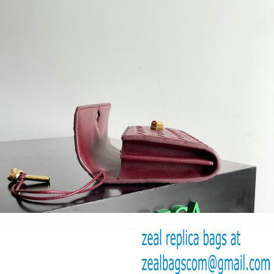 Bottega Veneta Andiamo Large Flap Wallet BAROLO with metallic knot closure 2024