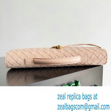 Bottega Veneta Long Clutch Andiamo With Handle Intrecciato leather bag Nude Pink with metallic knot closure 2024