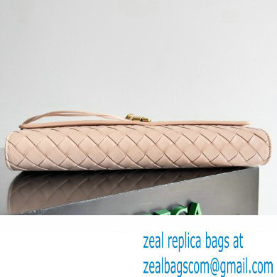 Bottega Veneta Long Clutch Andiamo With Handle Intrecciato leather bag Nude Pink with metallic knot closure 2024